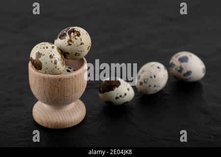 Fresh farm quail eggs in wooden box Stock Photo