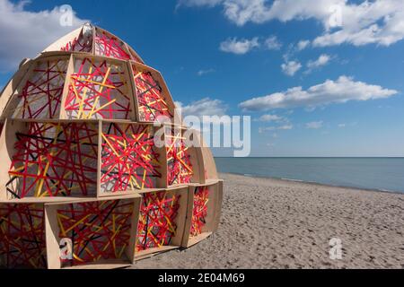 A lifeguard platform is used to create an interactive sculpture entitled 'Nest' for a Toronto Beach winter art competition. Stock Photo