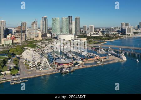 Miami, Florida - December 27, 2020 - Aerial view of Bayside Marketplace, City of Miami Marina and Miami skyline on sunny winter morning. Stock Photo