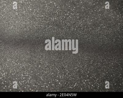 Black background texture with shiny speckles of white Stock Photo