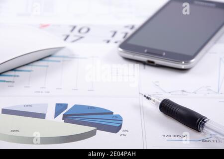 Project management: Office desk top view with graphic Stock Photo