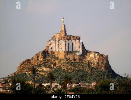 Originally built by the Moors as a castle Monteagudo was later held under Christian rule. The statue of Jesus Christ was erected on it in 1951. Stock Photo