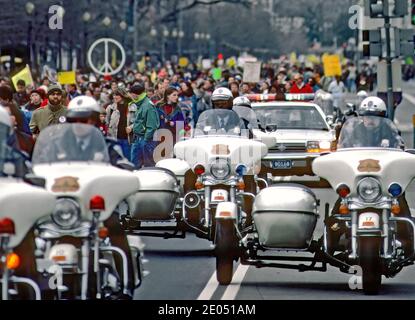 Washington, DC. USA, January 19, 1991DC Police motorcycles provide escort to Anti-Gulf war protesters as they walk from  the White House down Pennsylvania Ave to the US Capitol Credit: Mark Reinstein/MediaPunch Stock Photo