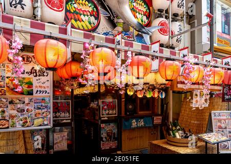 Tokyo, Japan - March 21, 2019:  An Izakaya (bar) in Tokyo, Japan. Stock Photo