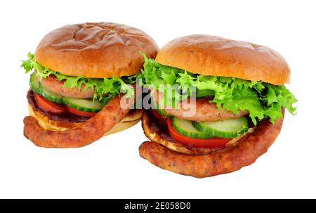 Cumberland sausage and salad sandwiches with barbecue sauce in a brioche bread rolls isolated on a white background Stock Photo