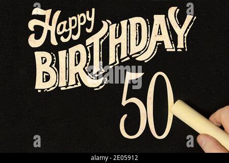 Chalk board and happy 50th birthday Stock Photo