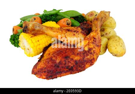 Roast piri piri chicken leg meal with vegetables isolated on a white background Stock Photo