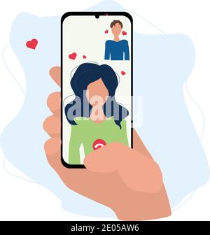 online date. hand holds a phone with a video call of a couple in love on the background of a heart Stock Vector