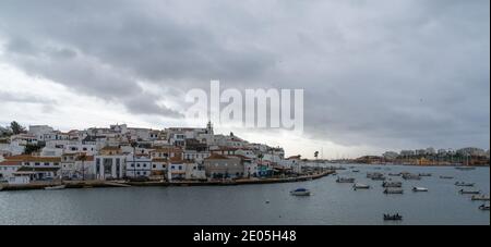 Ferragudo, Portugal - 27 December 2020: view of the quaint fishing village of Ferragudo on the Algarve coast of Portugal Stock Photo