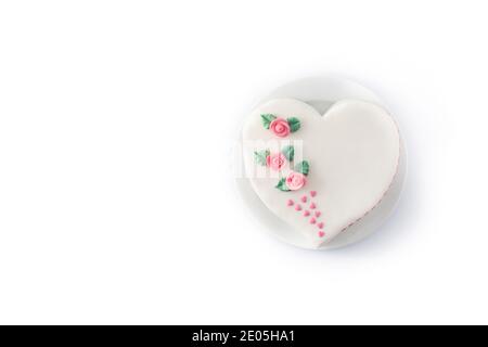Heart cake for St. Valentine's Day, Mother's Day, or Birthday, decorated with roses and pink sugar hearts isolated on white background Stock Photo