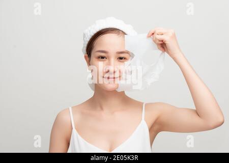 young beautiful woman in a face mask, skin care Stock Photo