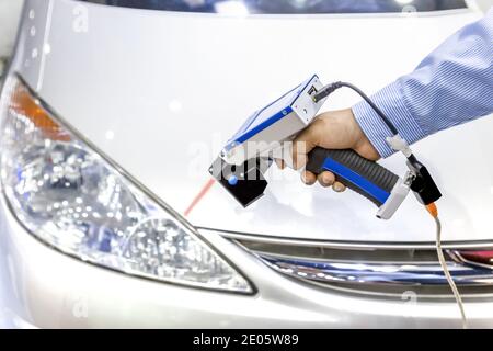 Close up touch probe of Automatic Coordinate measurement machine by CMM, Inspection dimension aluminum automotive parts by cnc programing control, hig Stock Photo