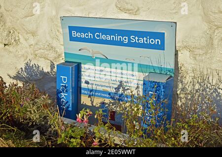 Beach cleaning station in Kinghorn, Fife, Scotland, UK. Containing equipment and instructions for volunteers to clean local beach. Stock Photo