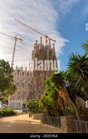 Barcelona, Spain: December 30 2020: Basicila and Expiatory Church of the Holy Family, known as Sagrada Familia at sunset in COVID Time. Stock Photo