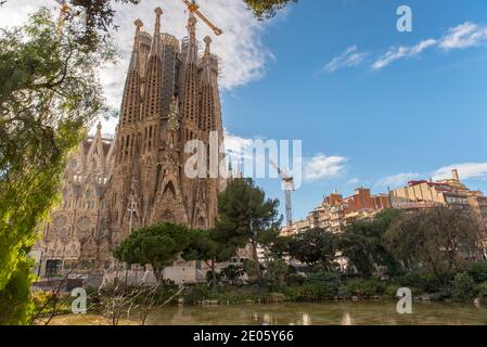 Barcelona, Spain: December 30 2020: Basicila and Expiatory Church of the Holy Family, known as Sagrada Familia at sunset in COVID Time. Stock Photo