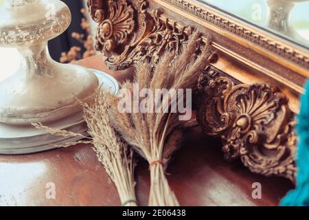 interior decoration, Detail image of the ornate, carved mirror frame in ancient style. Stock Photo