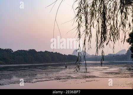 Sunset scenery by the Li River in Guilin, Guangxi Stock Photo