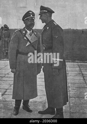 POLAND - 1940s: Heinrich Himmler (left) and Reinhard Heydrich during war campaign in Poland. Stock Photo