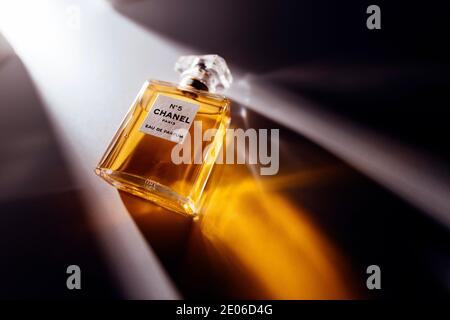 Each bottle of the Extrait perfume Chanel No. 5, a fragrance brought onto  the market by fashion designer Coco Chanel in 1921, is still sealed  airtight by hand with a golden bag.