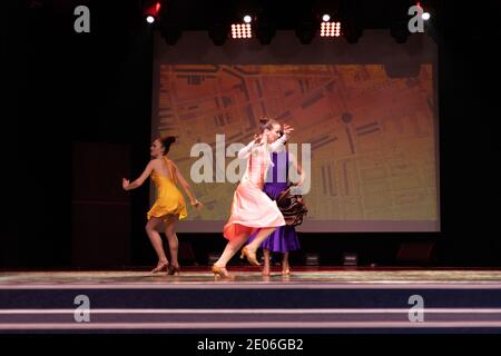 Dancer Actors perform on the theater stage in a dance show musical Stock Photo