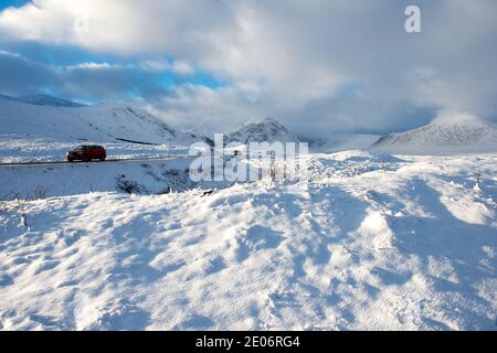 Glencoe, Scotland, UK. 30th Dec, 2020. Pictured: Yellow Weather warning for snow. Scenic Glencoe seen with snow cover. Freezing temperatures and more snow forecast. Credit: Colin Fisher/Alamy Live News