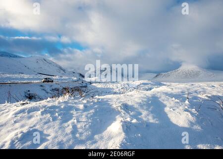 Glencoe, Scotland, UK. 30th Dec, 2020. Pictured: Yellow Weather warning for snow. Scenic Glencoe seen with snow cover. Freezing temperatures and more snow forecast. Credit: Colin Fisher/Alamy Live News