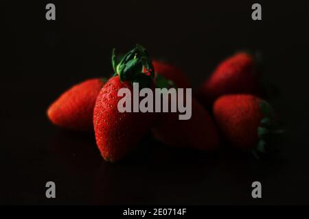 Strawberries on black background Stock Photo