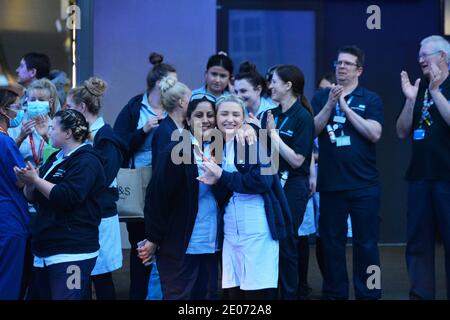 Emergency Service workers from Leicester gather at Leicester Royal Infirmary to applaud the NHS staff during clap for carers Stock Photo