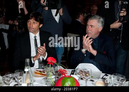 Carlo Ancelotti and Leonardo attending the annual lunch with the PSG staff and team held at Paris city hall (Hotel de Ville) in Paris, France on January 11, 2012. Photo by Nicolas Genin/ABACAPRESS.COM Stock Photo