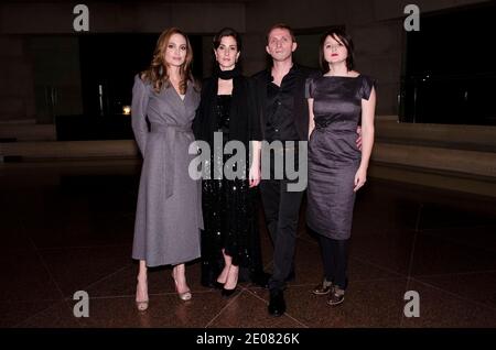 Angelina Jolie, Zana Marjanovic, Goran Kostic and,Vanessa Glodjo, pose for a photo during the 'In The Land of Blood and Honey' D.C. Premiere at the United States Holocaust Memorial Museum in Washington DC, USA on January 10, 2012. Photo by Kris Connor/ABACAUSA.COM. Stock Photo