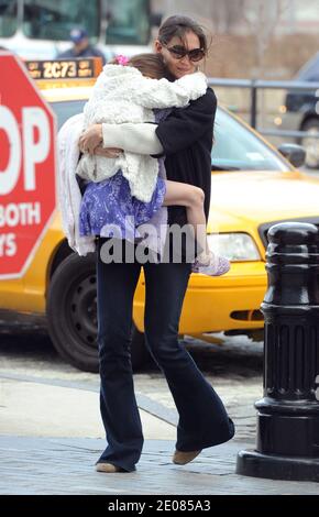 U.S actress Katie Holmes with her daughter Suri going to their famous playground at Chelsea Piers building in New York City, NY, USA, on January 13, 2012. Photo by Charles Guerin-Morgan Dessalles/ABACAPRESS.COM Stock Photo