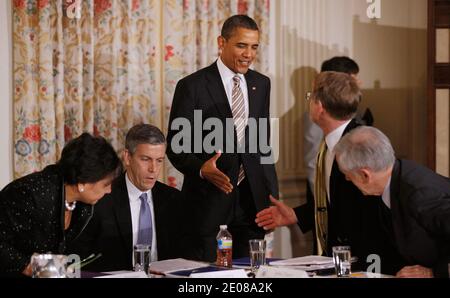 U.S. President Barack Obama individually greets members of his Council on Jobs and Competitiveness, a group of business leaders tapped to come up with job-spurring ideas, in the State Dining Room at the White House. The council released a report with suggestions, including investment in education and research and development, support for the manufacturing sector and reform in the tax and regulatory systems. in Washington, DC, USA on January 17, 2012. Photo by Chip Somodevilla/Pool/ABACAPRESS.COM Stock Photo