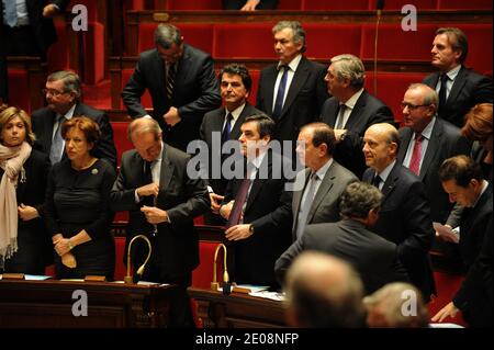 French Budget minister Valerie Pecresse, Solidarities minister Roselyne Bachelot, Defence Minister Gerard Longuet, Prime Minister Francois Fillon, Minister in charge of relations with the parliament Patrick Ollier and Foreign Affairs Minister Alain Juppe behind Justice Minister Michel Mercier, Junior minister for Foreign Trade Pierre Lellouche and minister for Public Service Francois Sauvadet pictured during weekly session of questions to the government at the French national Assembly in Paris, France on January 24, 2012. Photo by Mousse/ABACAPRESS.COM Stock Photo