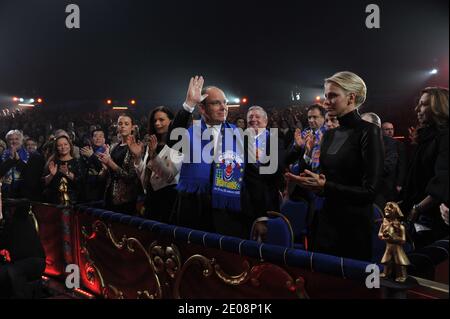 Monaco's Prince Albert, center, and Princess Charlene arrive at the