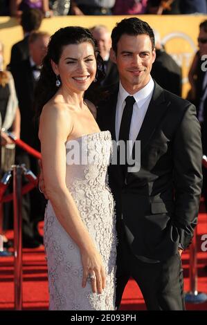 Julianna Margulies, left, and Keith Lieberthal attending the 18th Annual Screen Actors Guild (SAG) Awards held at the Shrine Auditorium in Los Angeles, CA on January 29, 2012. Photo by Lionel Hahn/ABACAPRESS.COM Stock Photo