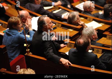 Socialist MP Claude Bartolone speaks with UMP's MP Olivier Dassault during weekly session of questions to the government at the French national Assembly in Paris, France on January 31, 2012. Photo by Mousse/ABACAPRESS.COM Stock Photo