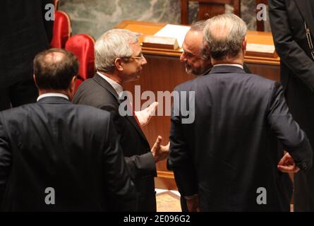 Socialist MP Claude Bartolone speaks with UMP's MP Olivier Dassault during weekly session of questions to the government at the French national Assembly in Paris, France on January 31, 2012. Photo by Mousse/ABACAPRESS.COM Stock Photo