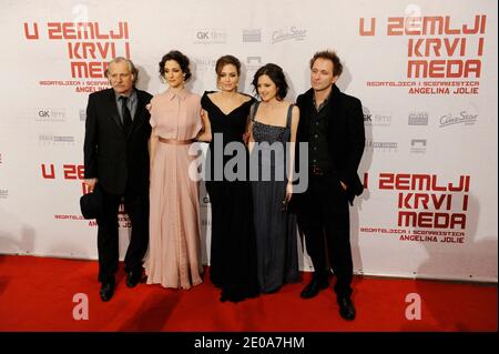 Actors of the movie In the Land of Blood and Honey, from left to right, Rade Serbedzija, Zana Marjanovic,Angelina Jolie ,director, Vanesa Glodjo and Goran Kostic pose during gala premiere in Sarajevo, on Feb. 14, 2012. Angelina is in Sarajevo for screening of her film 'In the Land of Blood and Honey'. Stock Photo