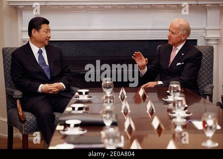 U.S. Vice President Joe Biden (R) and Chinese Vice President Xi Jinping hold an expanded bilateral meeting with other U.S. and Chinese officials in the Roosevelt Room at the White House in Washington on February 14, 2012. While in Washington, Vice President Xi will meet with Biden, President Barack Obama and other senior Administration officials to discuss a broad range of bilateral, regional, and global issues. Photo by Chip Somodevilla/Pool/ABACAPRESS.COM Stock Photo