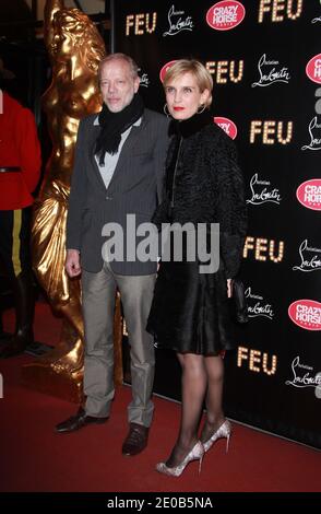 Pascal Greggory and Melita Toscan du Plantier attending the premiere of 'Feu' by Christian Louboutin at the Crazy Horse, in Paris, France, on March 12, 2012. French shoe and bag designer Louboutin is the Crazy Horse's new Art Director. Photo by Denis Guignebourg/ABACAPRESS.COM Stock Photo