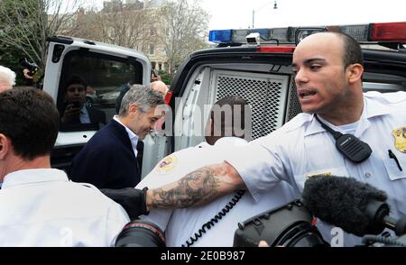 US actor George Clooney is being arrested after a demonstration outside of the Sudan Embassy in Washington, DC, on March 16, 2012. Photo by Olivier Douliery/ABACAPRESS.COM Stock Photo