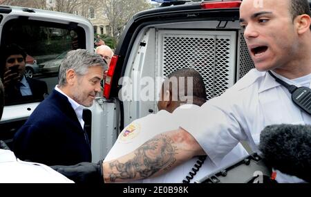 US actor George Clooney is being arrested after a demonstration outside of the Sudan Embassy in Washington, DC, on March 16, 2012. Photo by Olivier Douliery/ABACAPRESS.COM Stock Photo