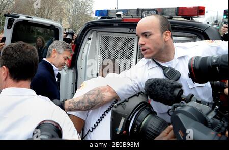 US actor George Clooney is being arrested after a demonstration outside of the Sudan Embassy in Washington, DC, on March 16, 2012. Photo by Olivier Douliery/ABACAPRESS.COM Stock Photo