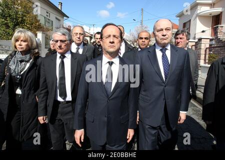 France's opposition Socialist Party (PS) candidate for the 2012 presidential election Francois Hollande (C) arrives to visit the 'Ozar Hatorah' Jewish school, next to Toulouse's mayor Pierre Cohen (2nd L), Elisabeth Guigou and Jean-Michel Baylet on March 19, 2012 in Toulouse, southwestern France, where four people (three of them children), were killed and one seriously wounded when a gunman opened fire. This is the third gun attack in a week by a man who fled on a motorbike. Photo by Manuel Blondeau/ABACAPRESS.COM Stock Photo