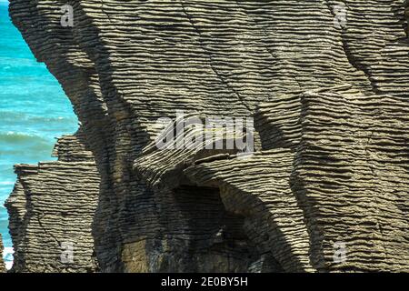 Close view of the Pancake rocks an unusual geological formation of sedimentary rocks in New Zealand's South Island Stock Photo