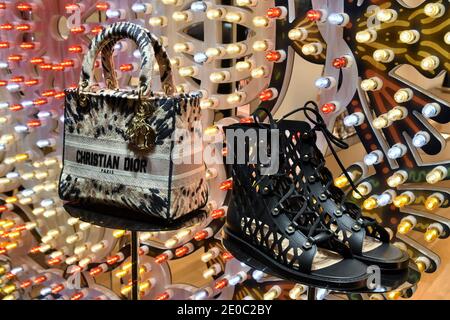 BAG AND SHOES ON DISPLAY AT CHRISTIAN DIOR BOUTIQUE