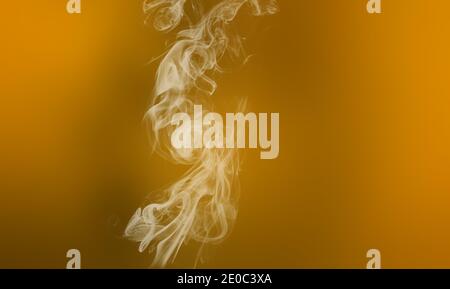 Light smoke on dirty olive to brown blurry gradient. Abstract mystic freeze motion diffusion background Stock Photo