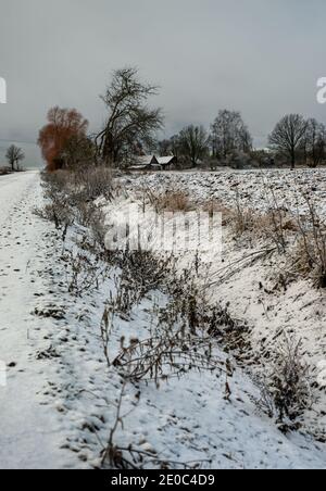 Landscape along country road in a winter. Stock Photo