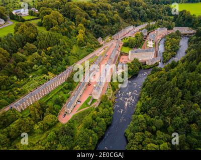 Aerial of the industrial town of New Lanark, UNESCO World Heritage Site, Scotland, United Kingdom, Europe Stock Photo