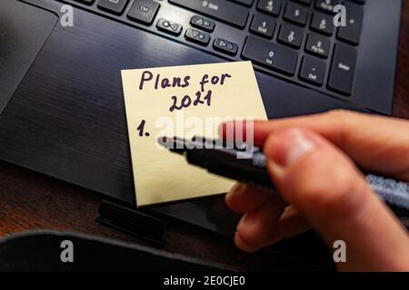Check boxes on white paper plans for 2021. Stock Photo